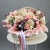 Композиция в корзине "Диодора" из французских роз Квиксенд, диантусов и кустовых пионовидных роз Бомбастик в Подольске